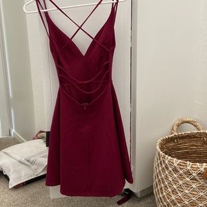 “Backless” strapped dress
